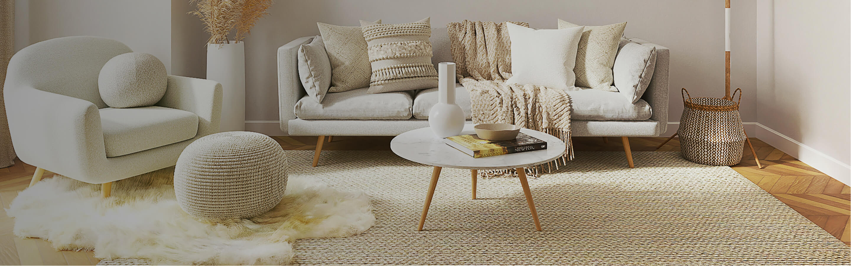 neutral beige area rug in living space with cream tone furniture