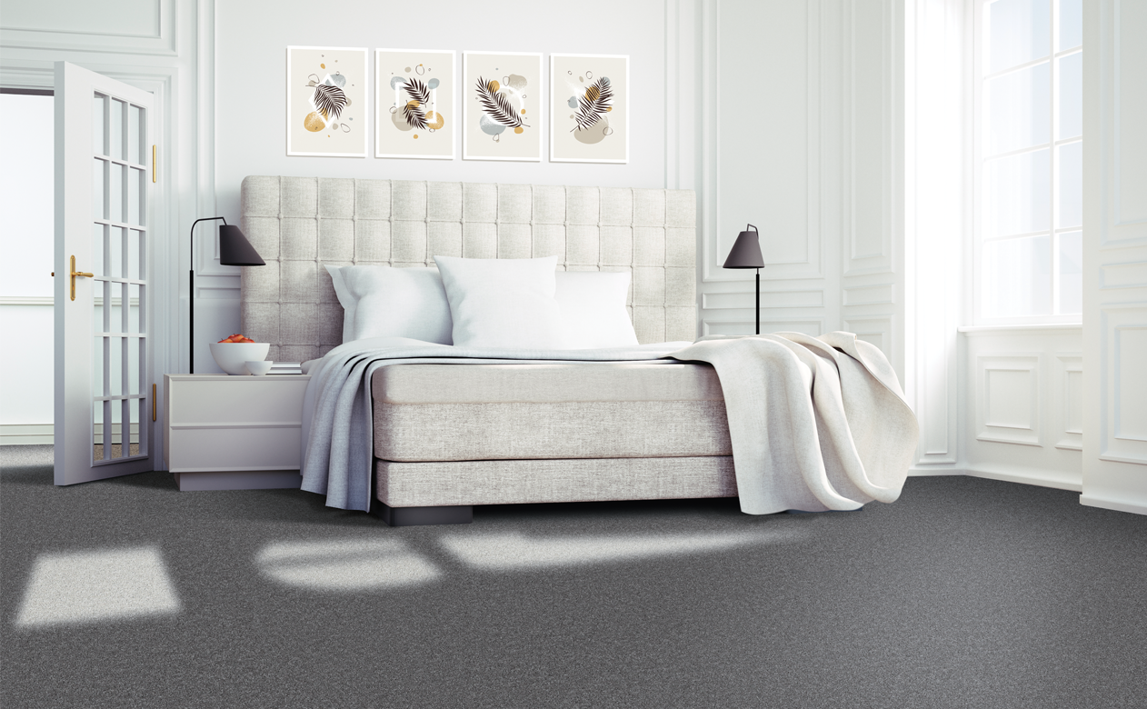 Charcoal carpet in master bedroom upholstered headboard 