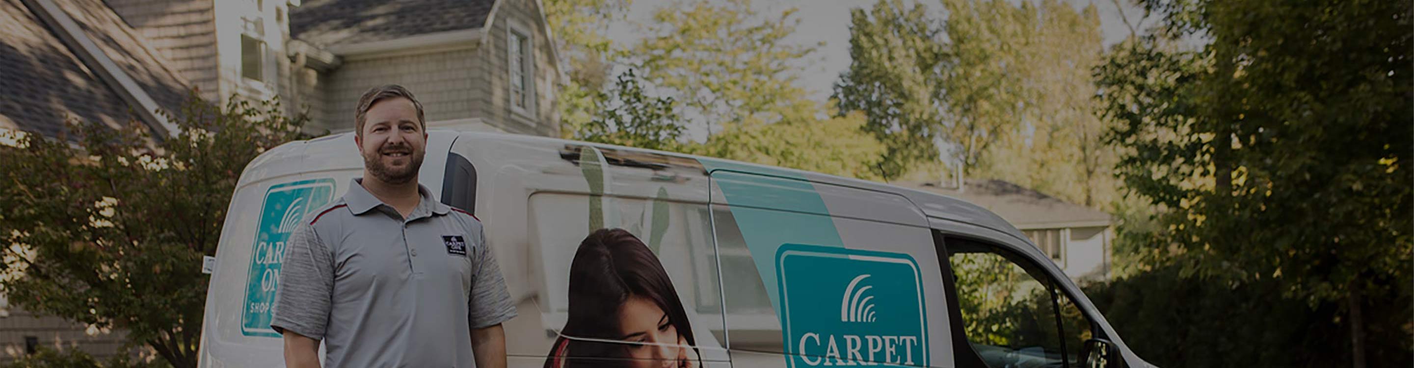 Man standing in front of service van