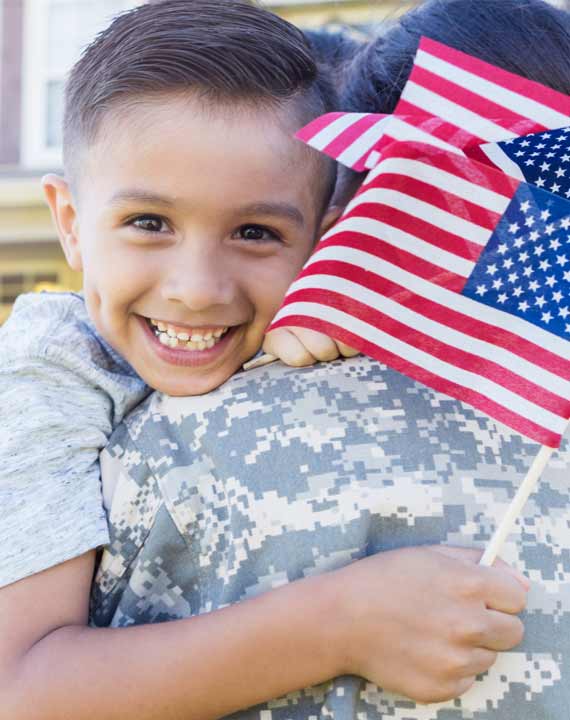 child holding american flag